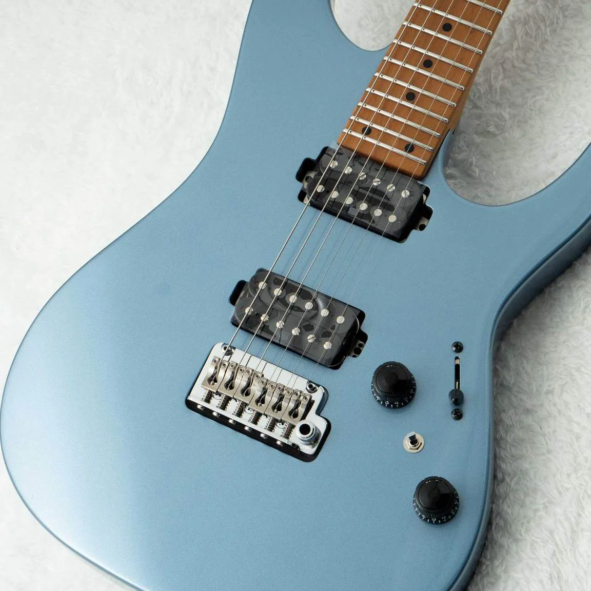 Ibanez AZ2402-ICM · Ice Blue Metallic · Actual instrument: angled body view