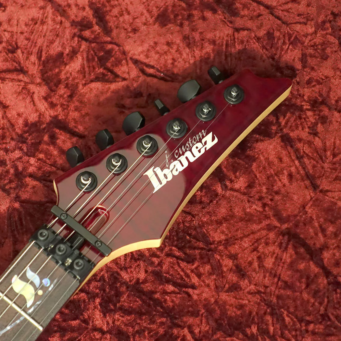 Ibanez RG8870-AGT · Almandite Garnet · Actual instrument: headstock front