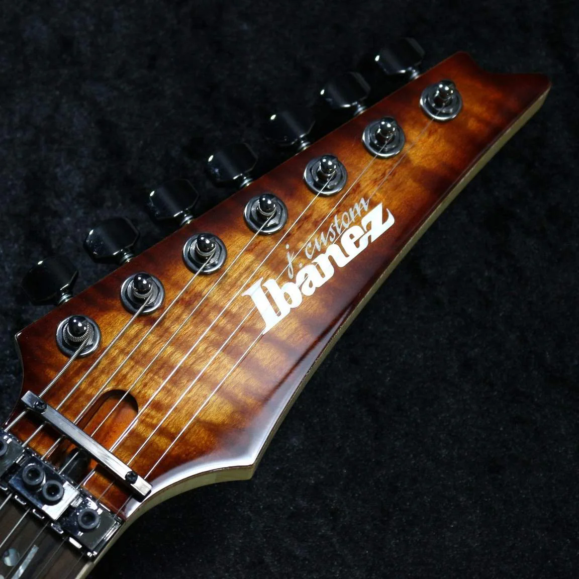 Ibanez RG8527-BSR · Brownish Sphalerite · Actual instrument: headstock front