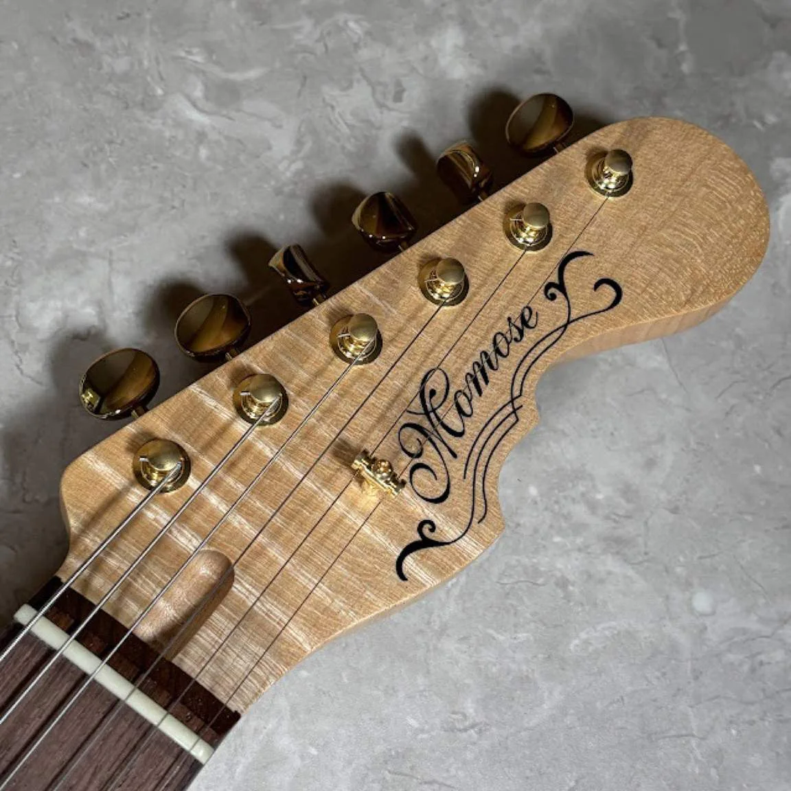 Momose MC-HOLLOW-Premium/FT · Natural Amber · Actual headstock front