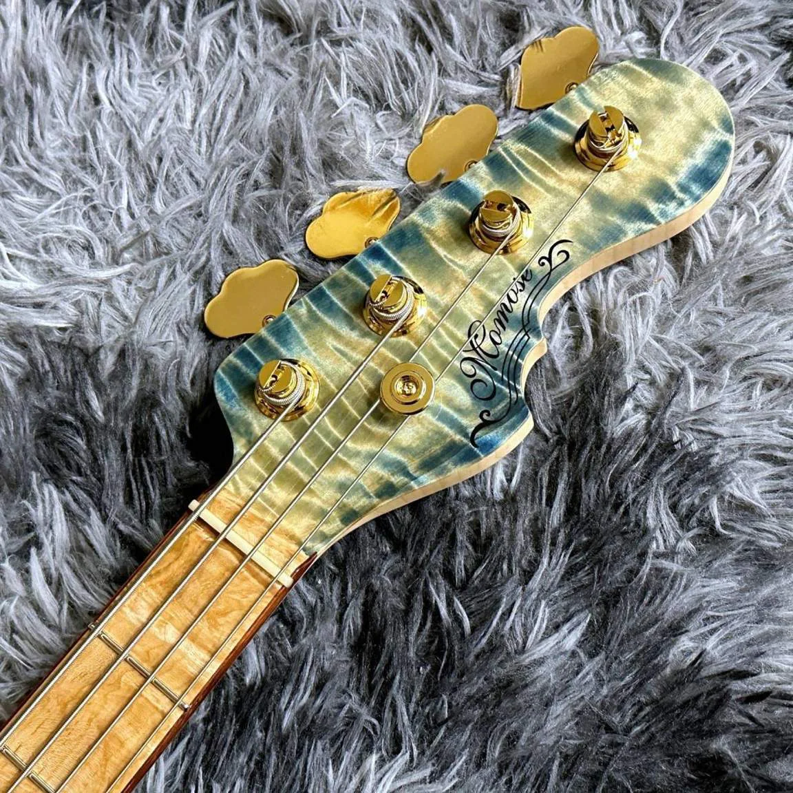 Momose MPJ-EWC-AC FT/ASH SP'26/EM · BLU-VGR · Actual headstock front