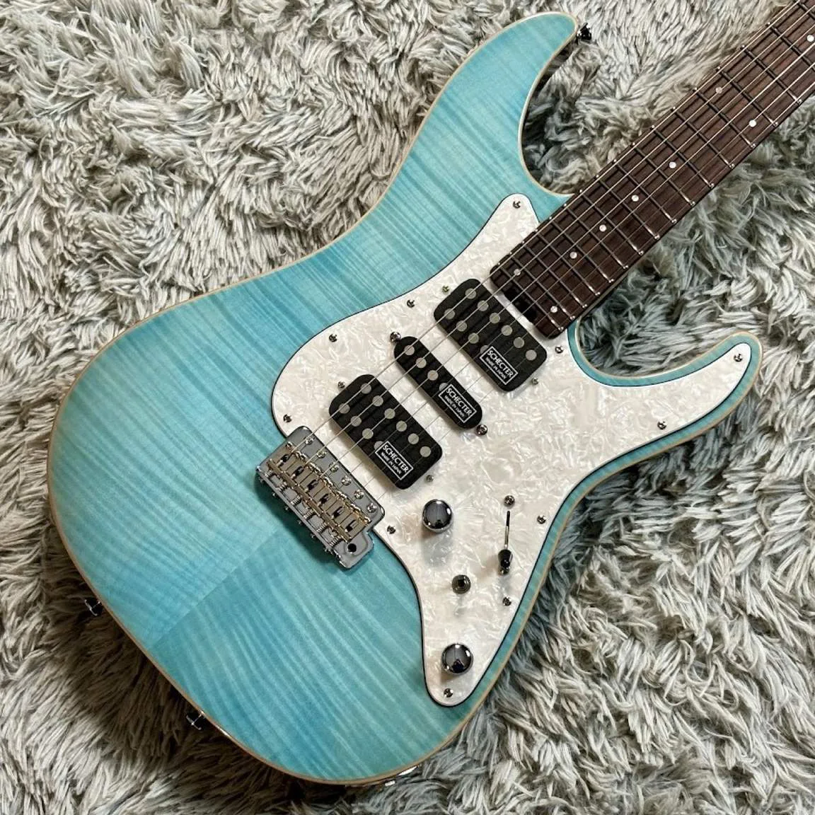 Schecter L-SD-DX-24-VTR/R · Aqua Blue · 实物琴体正面