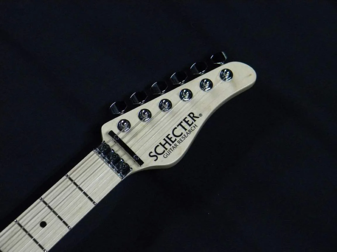 Schecter NV-III-24-AL · See-Through Blue · 实物琴头正面