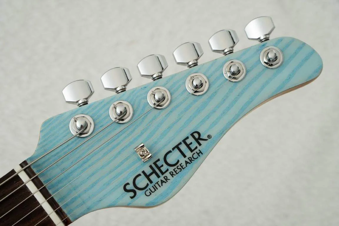 Schecter AR-06-2H-AS · See-Through Sonic Blue · Actual instrument, headstock front