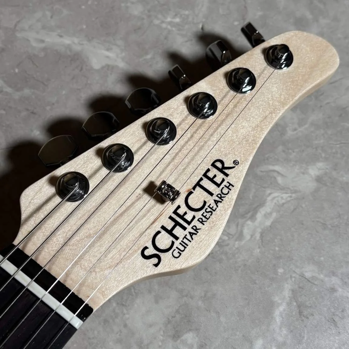 Schecter SD-2-24-AL-VTR/R · See-Through Blue · Actual instrument, headstock front