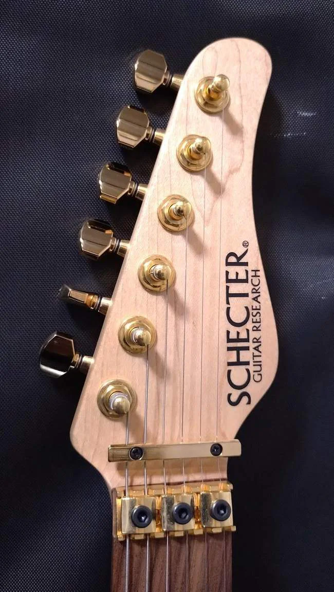 Schecter NV-4-24-AL-FM/OGR/R · See-Through Orange · Actual instrument detail 1