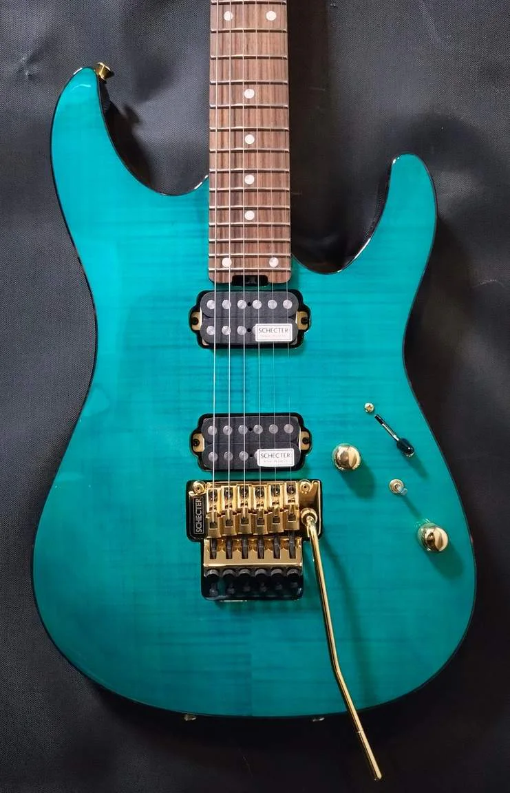 Schecter NV-4-24-AL-FM/OGR/R · See-Through Orange · Actual instrument detail