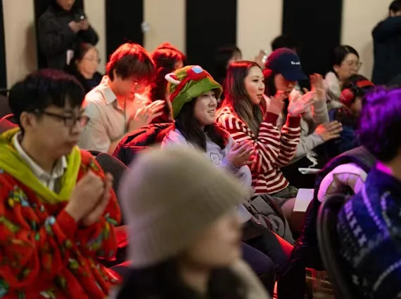 Audience enjoying a studio recital