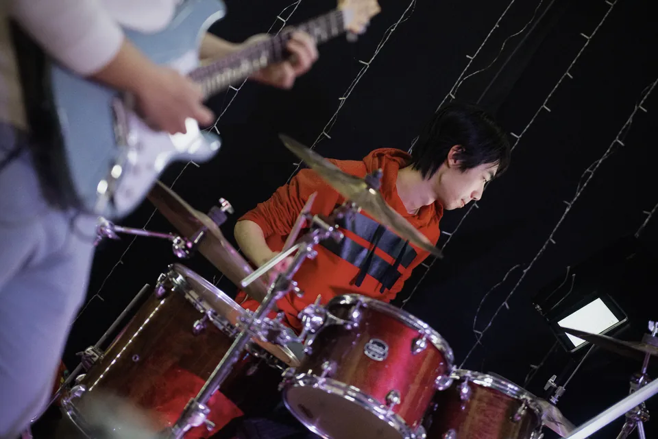 Drummer performing on stage